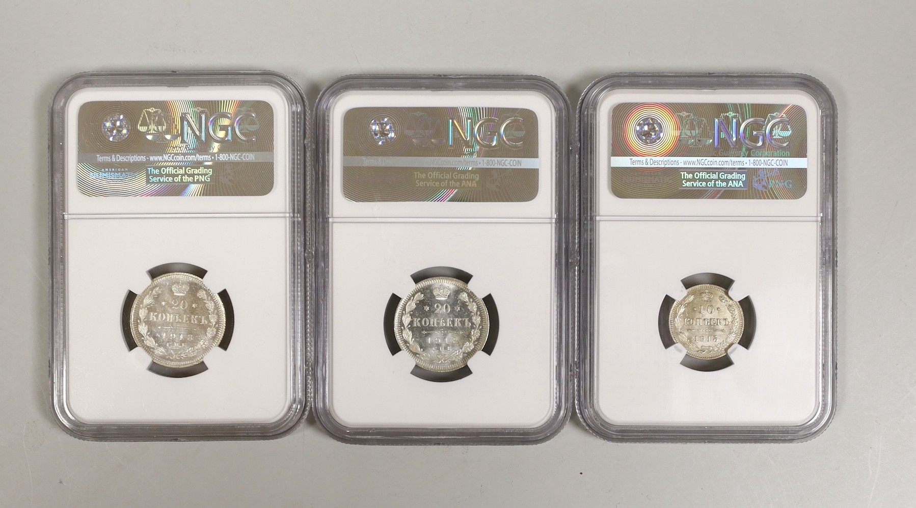 Russia coins, two 20 kopeks 1913CNB and 10 kopeks 1915BC, all NGC slabbed and graded MS66 (3)